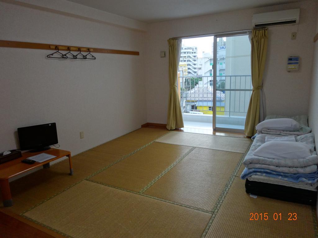 Hotel Minshuku Getto Naha Pokoj fotografie