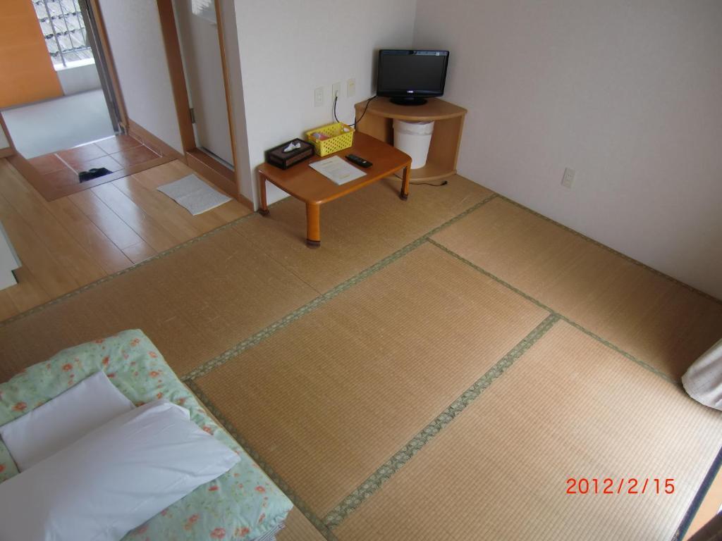 Hotel Minshuku Getto Naha Pokoj fotografie