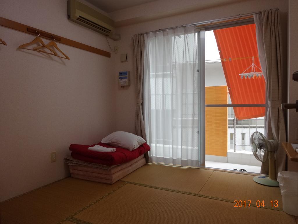 Hotel Minshuku Getto Naha Pokoj fotografie